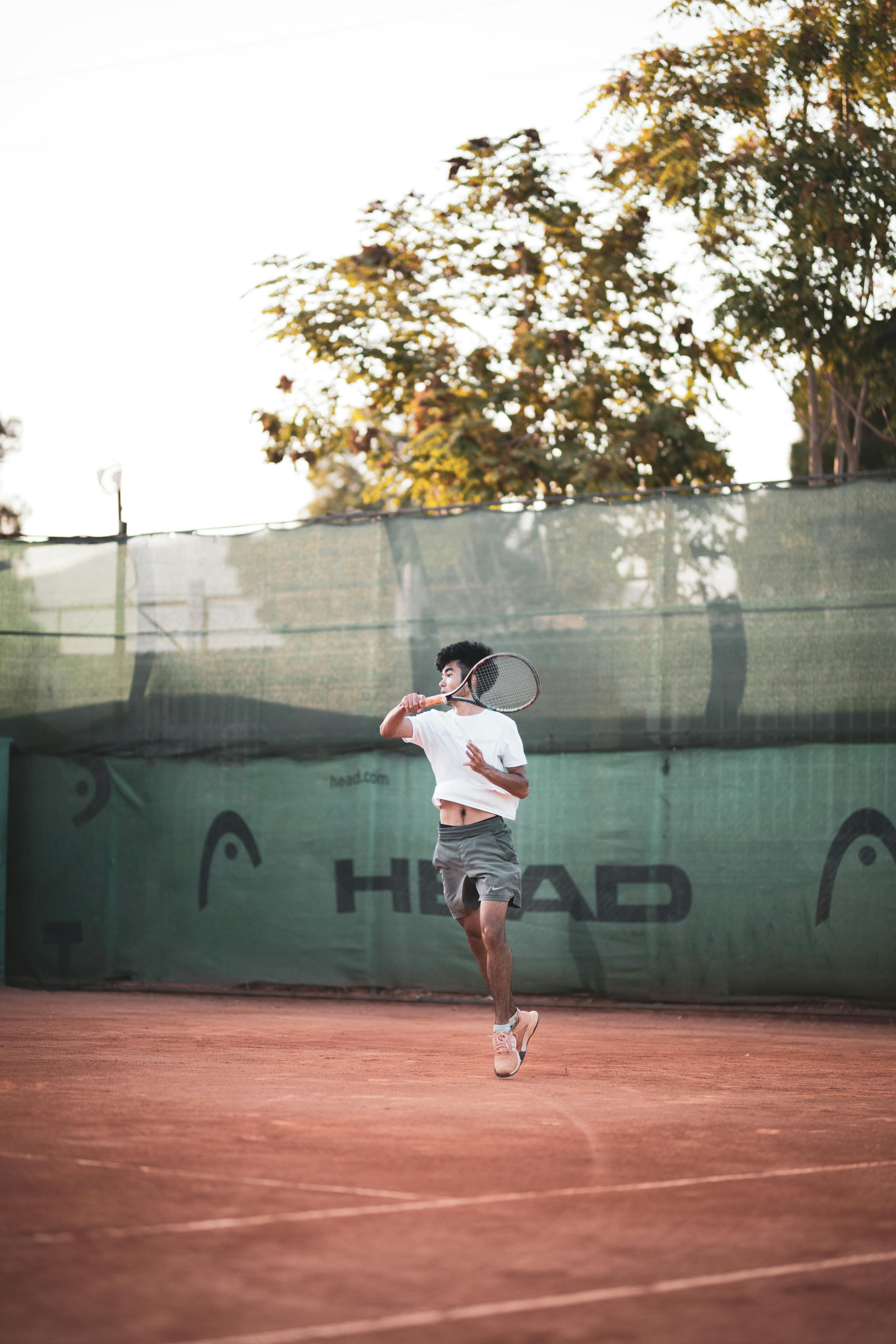 Professional athlete training on a tennis court